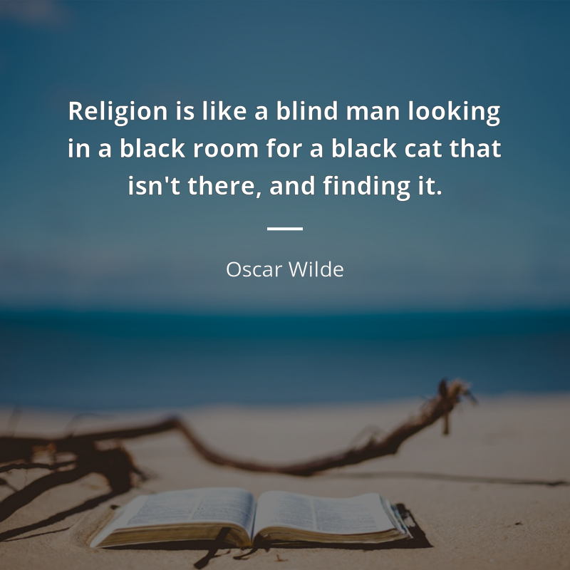 Oscar Wilde frase: “Religion is like a blind man looking in a black room for a black cat that isn't there, and finding it.”